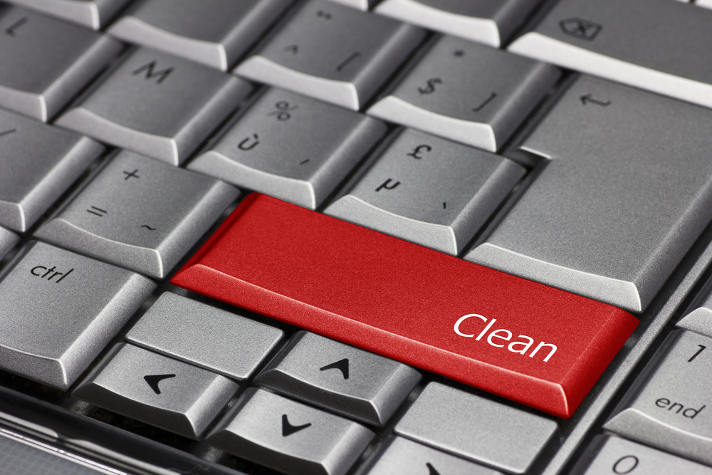 A red “clean” key on a computer keyboard.