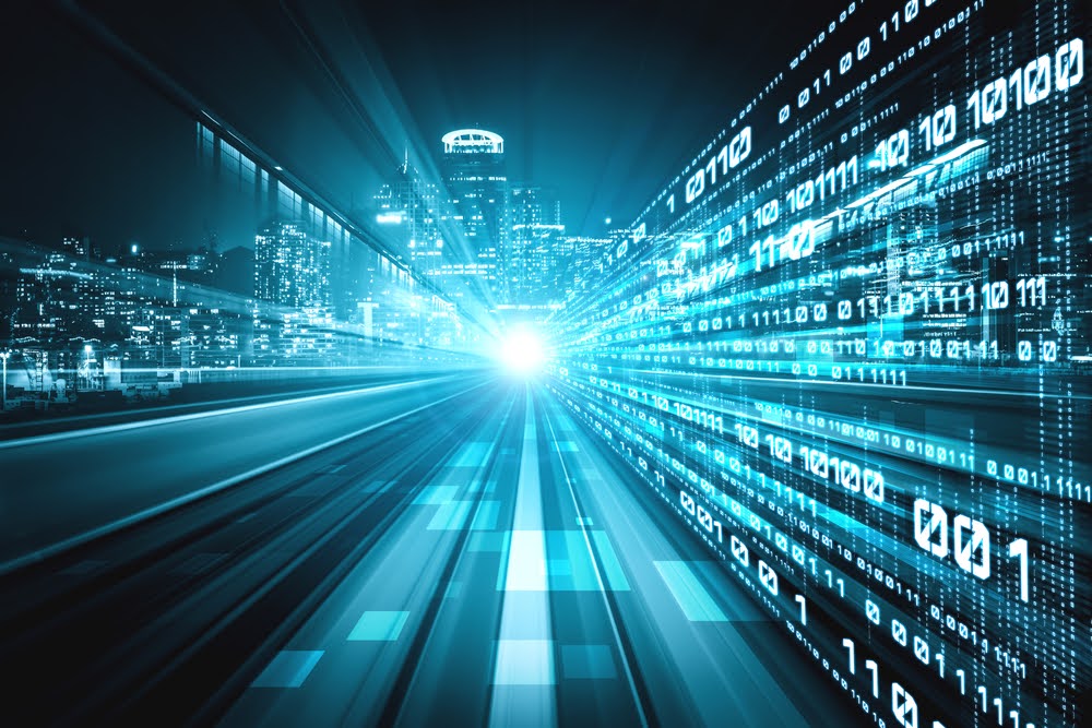Graphic showing digital streams of data over night-time cityscape.